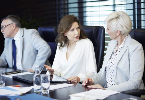Business women conversating at work